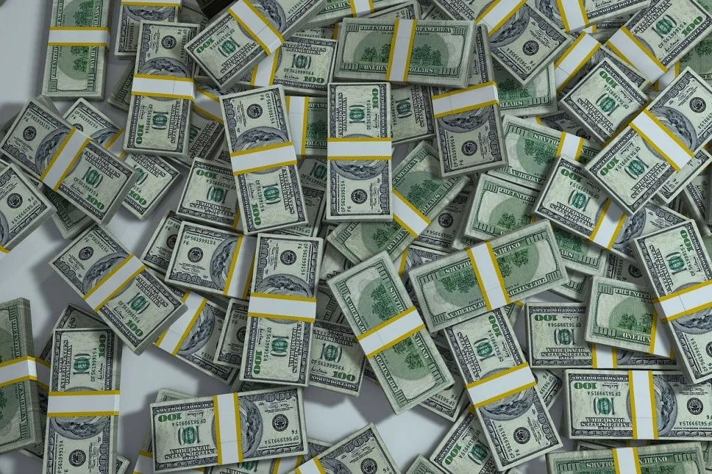 Pile of banded stacks of hundred-dollar bills