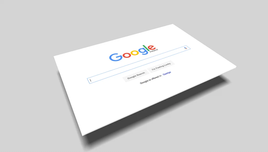 Google search homepage shown on a tilted white panel